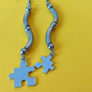 NWOT Puzzle Piece Earrings